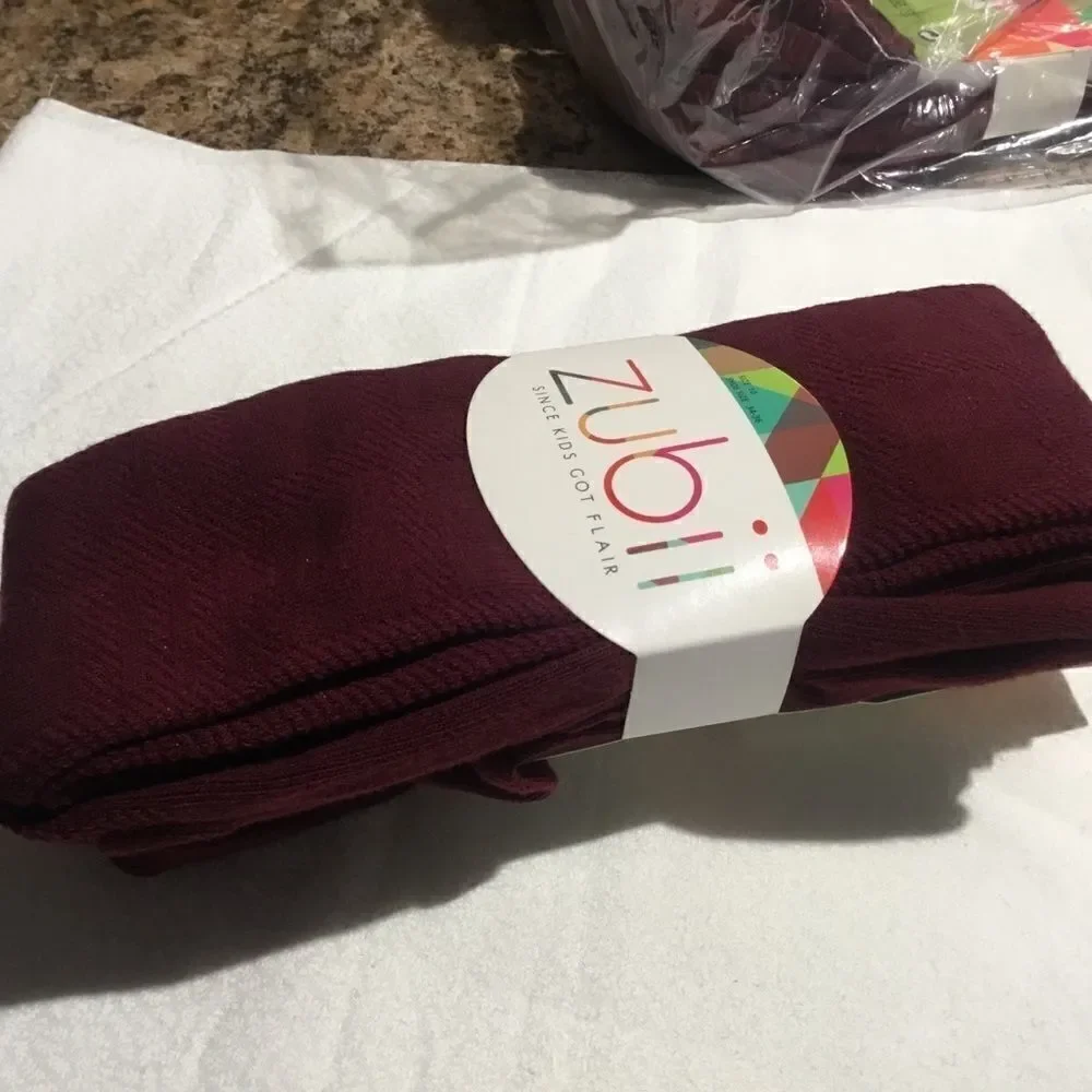 SALE. BUY 3/$10. NWT. Girls Tights Size 10. Wine Colored